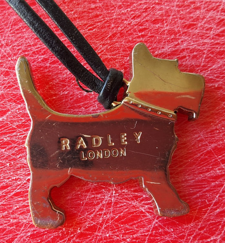 Radley gold metal dog - radley, tag